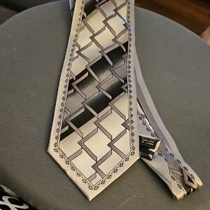Geometric Patterned Tie in Black and Gray. By Karl Knox.
